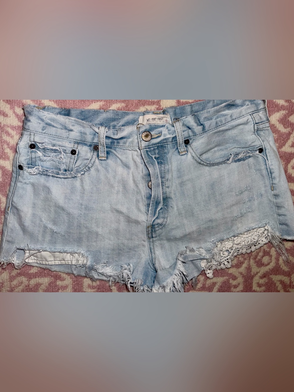 We The Free Light Wash Distressed Denim Shorts with Lace Trim